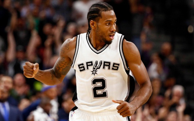 Nov 25, 2015; San Antonio, TX, USA; San Antonio Spurs small forward Kawhi Leonard (2) reacts after a shot against the Dallas Mavericks during the second half at AT&T Center. Mandatory Credit: Soobum Im-USA TODAY Sports