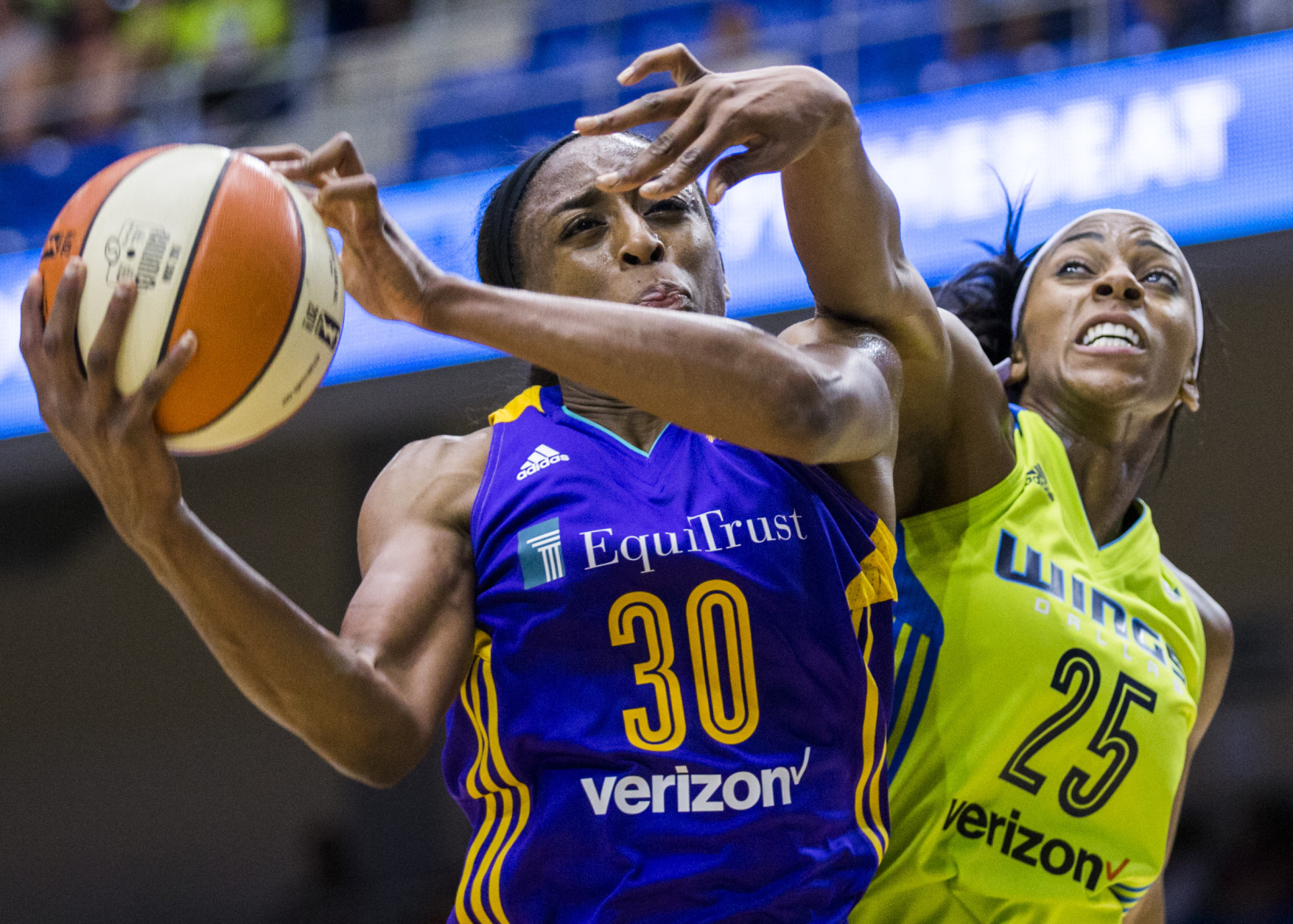 Dallas Wings forward Glory Johnson (25) blocks the shot of Los Angeles Sparks forward Nneka Ogwumike (30) during the first quarter of their WNBA basketball game, Saturday, June 11, 2016  in Arlington, Texas. (Ashley Landis/The Dallas Morning News via AP)  -- MANDATORY CREDIT, TV OUT, MAGS OUT, NO SALES, INTERNET USE BY AP MEMBERS ONLY